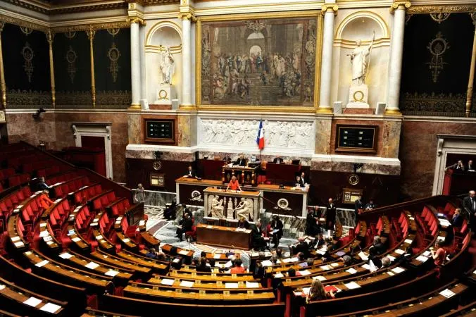 Picture from CoinDesk for: France weighs 31.4% tax on EU-regulated stablecoin swaps