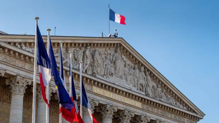 Picture from Bitcoin.com News for: France's National Assembly backs 31.4% tax on crypto-to-stablecoin swaps